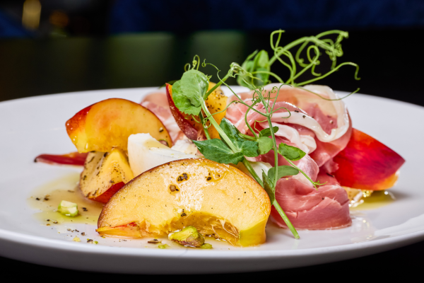 Burrata & Stone Fruit Salad shaved prosciutto, honey vinaigrette, crushed pistachios  