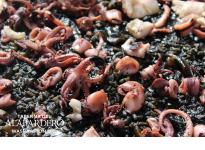 Arroz Negro - Paella with squid ink, baby octopus and squid